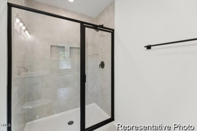 This semi-custom home in the gated, resort-style Lake Royale on River Golf and County Club at Lake Royale in North Carolina - for sale on GolfHomes.com, golf home, golf lot