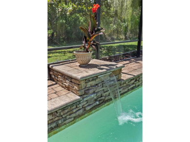 Located on a quiet cul-de-sac in the highly sought-after gated on Plantation Bay Golf and Country Club in Florida - for sale on GolfHomes.com, golf home, golf lot