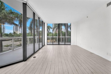 Stunning remodeled unit with golf views! Experience modern on Turnberry Isle Resort and Club in Florida - for sale on GolfHomes.com, golf home, golf lot