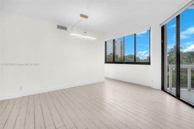 Stunning remodeled unit with golf views! Experience modern on Turnberry Isle Resort and Club in Florida - for sale on GolfHomes.com, golf home, golf lot