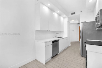 Stunning remodeled unit with golf views! Experience modern on Turnberry Isle Resort and Club in Florida - for sale on GolfHomes.com, golf home, golf lot