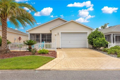 Welcome home! This cozy 2/2 Patio Villa in the Village of on Truman Executive Golf Course in Florida - for sale on GolfHomes.com, golf home, golf lot