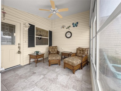 Welcome home! This cozy 2/2 Patio Villa in the Village of on Truman Executive Golf Course in Florida - for sale on GolfHomes.com, golf home, golf lot