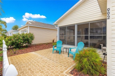 Welcome home! This cozy 2/2 Patio Villa in the Village of on Truman Executive Golf Course in Florida - for sale on GolfHomes.com, golf home, golf lot