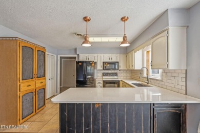 This home offers comfort, convenience, and thoughtful design on Druid Hills Golf Club in Tennessee - for sale on GolfHomes.com, golf home, golf lot