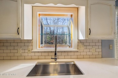 This home offers comfort, convenience, and thoughtful design on Druid Hills Golf Club in Tennessee - for sale on GolfHomes.com, golf home, golf lot