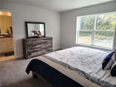 THE SANDHILL TOWNHOUSE - YEARLY BLOWOUT SALES, LOWEST INTEREST on Inverness Golf and Country Club in Florida - for sale on GolfHomes.com, golf home, golf lot