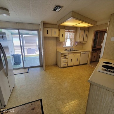 A little TLC could go along way here. Over 1300 sqft of living on Six Lakes Country Club in Florida - for sale on GolfHomes.com, golf home, golf lot