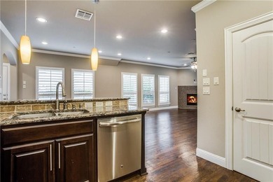 Updates galore in this exceptional end-unit townhome located in on TPC At Craig Ranch in Texas - for sale on GolfHomes.com, golf home, golf lot