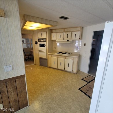 A little TLC could go along way here. Over 1300 sqft of living on Six Lakes Country Club in Florida - for sale on GolfHomes.com, golf home, golf lot