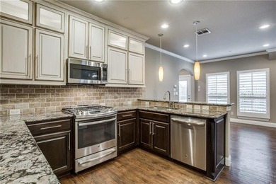 Updates galore in this exceptional end-unit townhome located in on TPC At Craig Ranch in Texas - for sale on GolfHomes.com, golf home, golf lot