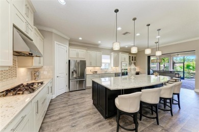 A unique backyard oasis ... in the heart of Esplanade Golf on Esplanade Golf and Country at Lakewood Ranch in Florida - for sale on GolfHomes.com, golf home, golf lot