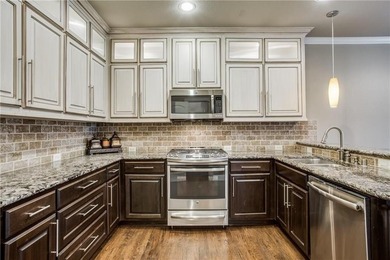 Updates galore in this exceptional end-unit townhome located in on TPC At Craig Ranch in Texas - for sale on GolfHomes.com, golf home, golf lot