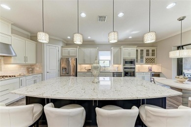A unique backyard oasis ... in the heart of Esplanade Golf on Esplanade Golf and Country at Lakewood Ranch in Florida - for sale on GolfHomes.com, golf home, golf lot