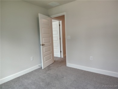 THE SANDHILL TOWNHOUSE - YEARLY BLOWOUT SALES, LOWEST INTEREST on Inverness Golf and Country Club in Florida - for sale on GolfHomes.com, golf home, golf lot