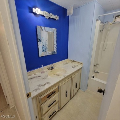 A little TLC could go along way here. Over 1300 sqft of living on Six Lakes Country Club in Florida - for sale on GolfHomes.com, golf home, golf lot