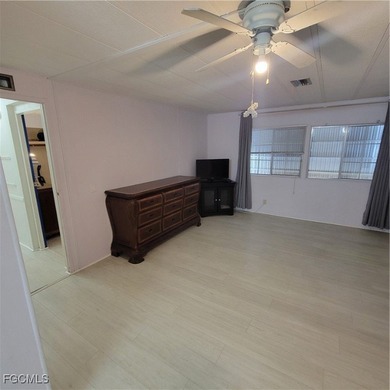 A little TLC could go along way here. Over 1300 sqft of living on Six Lakes Country Club in Florida - for sale on GolfHomes.com, golf home, golf lot