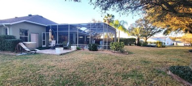 Welcome to this stunning LANTANA with HEATED POOL home, SPA on The Links of Spruce Creek in Florida - for sale on GolfHomes.com, golf home, golf lot