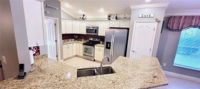 Welcome to this stunning LANTANA with HEATED POOL home, SPA on The Links of Spruce Creek in Florida - for sale on GolfHomes.com, golf home, golf lot