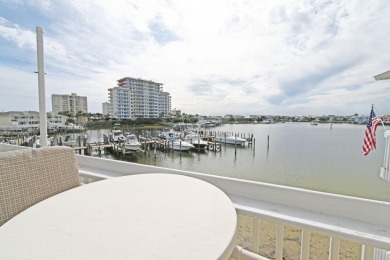 Nestled within the Sandpiper Cove resort, this unit boasts a on Sandpiper Cove Golf Course in Florida - for sale on GolfHomes.com, golf home, golf lot