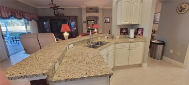 Welcome to this stunning LANTANA with HEATED POOL home, SPA on The Links of Spruce Creek in Florida - for sale on GolfHomes.com, golf home, golf lot