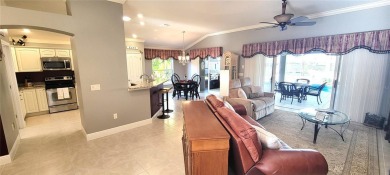 Welcome to this stunning LANTANA with HEATED POOL home, SPA on The Links of Spruce Creek in Florida - for sale on GolfHomes.com, golf home, golf lot