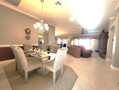 Welcome to this stunning LANTANA with HEATED POOL home, SPA on The Links of Spruce Creek in Florida - for sale on GolfHomes.com, golf home, golf lot