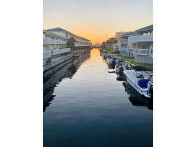 Nestled within the Sandpiper Cove resort, this unit boasts a on Sandpiper Cove Golf Course in Florida - for sale on GolfHomes.com, golf home, golf lot