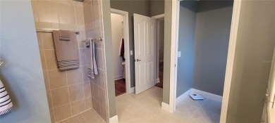 Welcome to this stunning LANTANA with HEATED POOL home, SPA on The Links of Spruce Creek in Florida - for sale on GolfHomes.com, golf home, golf lot