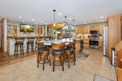 One-of-a-kind Northern Bay condo overlooking Tee Box #2! This on Northern Bay Golf Resort and Marina in Wisconsin - for sale on GolfHomes.com, golf home, golf lot