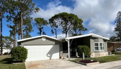 Welcome your guests to a private and serene space, situated on on Del Tura Golf and Country Club in Florida - for sale on GolfHomes.com, golf home, golf lot
