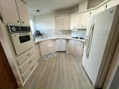 Welcome your guests to a private and serene space, situated on on Del Tura Golf and Country Club in Florida - for sale on GolfHomes.com, golf home, golf lot