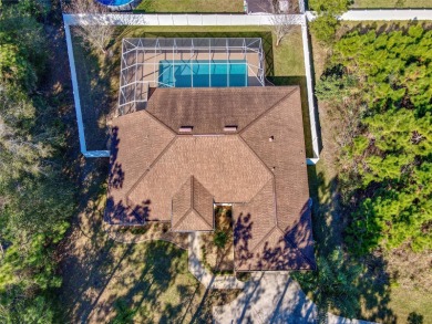 Welcome to your dream home! New roof coming May 2024! This on The Grand Club - Pine Lakes Course in Florida - for sale on GolfHomes.com, golf home, golf lot