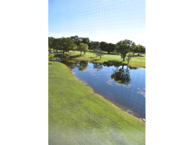 Open the door to a breathtaking open vista to the southeast on Sunrise Lakes Phase III in Florida - for sale on GolfHomes.com, golf home, golf lot