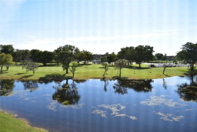 Open the door to a breathtaking open vista to the southeast on Sunrise Lakes Phase III in Florida - for sale on GolfHomes.com, golf home, golf lot