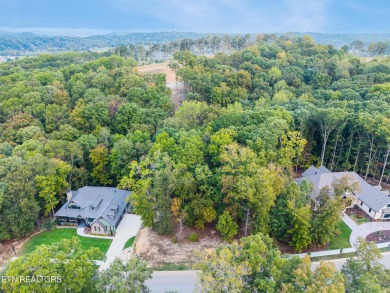 Nestled within an exclusive golf community, this stunning lot on Tennessee National Golf Club in Tennessee - for sale on GolfHomes.com, golf home, golf lot