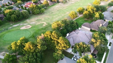 Immerse yourself in refined elegance at 4712 96th Street. This on LakeRidge Country Club in Texas - for sale on GolfHomes.com, golf home, golf lot