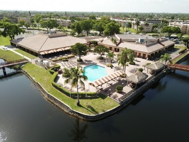 Open the door to a breathtaking open vista to the southeast on Sunrise Lakes Phase III in Florida - for sale on GolfHomes.com, golf home, golf lot