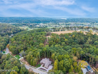 Nestled within an exclusive golf community, this stunning lot on Tennessee National Golf Club in Tennessee - for sale on GolfHomes.com, golf home, golf lot