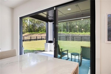 Welcome home to this executive home built by the Toll Brothers on Capital City Club Crabapple in Georgia - for sale on GolfHomes.com, golf home, golf lot