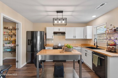 Welcome home to this beautifully updated 3-bedroom, 2.5-bath on Lennon Hills Golf Course in North Carolina - for sale on GolfHomes.com, golf home, golf lot