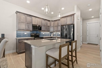 This beautifully crafted, Italian-inspired end unit luxury on Highland Meadows Golf Course in Colorado - for sale on GolfHomes.com, golf home, golf lot