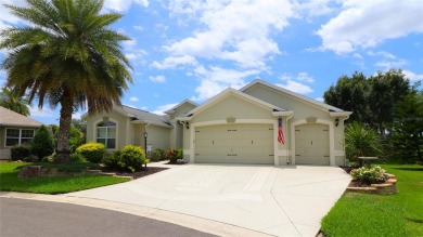 Welcome in to this gorgeous 3/2 Lantana with a golf cart garage on The Links of Spruce Creek in Florida - for sale on GolfHomes.com, golf home, golf lot