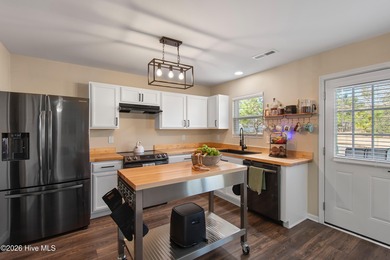 Welcome home to this beautifully updated 3-bedroom, 2.5-bath on Lennon Hills Golf Course in North Carolina - for sale on GolfHomes.com, golf home, golf lot