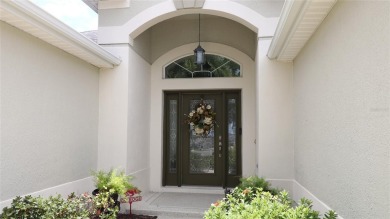 Welcome in to this gorgeous 3/2 Lantana with a golf cart garage on The Links of Spruce Creek in Florida - for sale on GolfHomes.com, golf home, golf lot