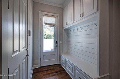 Stunning home on the golf course in sought after Lake Caroline! on Lake Caroline Golf Club in Mississippi - for sale on GolfHomes.com, golf home, golf lot