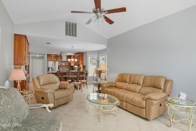 Stately Bay Point pool home with screened lanai on quiet on Bay Point Resort Golf Club in Florida - for sale on GolfHomes.com, golf home, golf lot