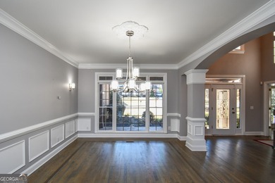 Live the ultimate resort-style lifestyle in this stunning on Hamilton Mill Golf Club in Georgia - for sale on GolfHomes.com, golf home, golf lot