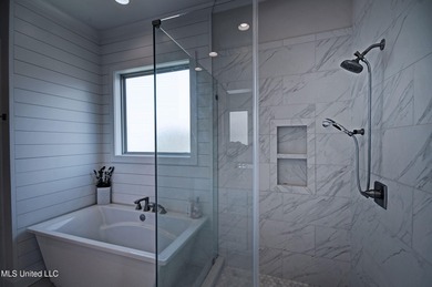 Stunning home on the golf course in sought after Lake Caroline! on Lake Caroline Golf Club in Mississippi - for sale on GolfHomes.com, golf home, golf lot