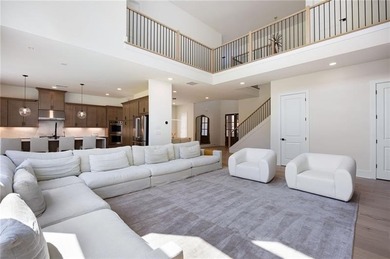 Welcome home to this executive home built by the Toll Brothers on Capital City Club Crabapple in Georgia - for sale on GolfHomes.com, golf home, golf lot